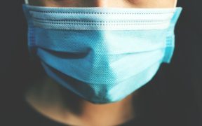 a photo of a person in a surgical mask