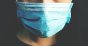 a photo of a person in a surgical mask